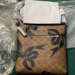 Coach Tan and Black Floral Crossbody Bag